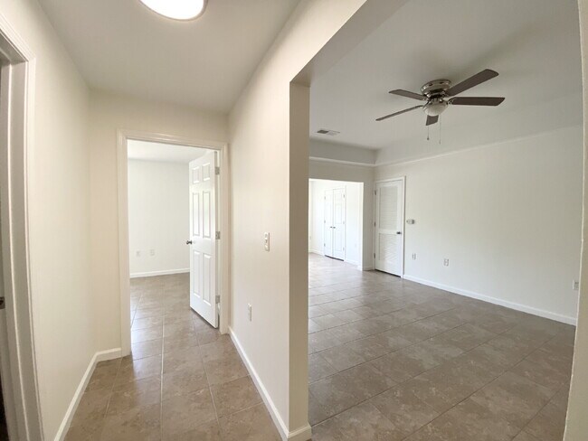 Building Photo - Spacious Three Bedroom Condo Located at The Reserve at Woodbridge!