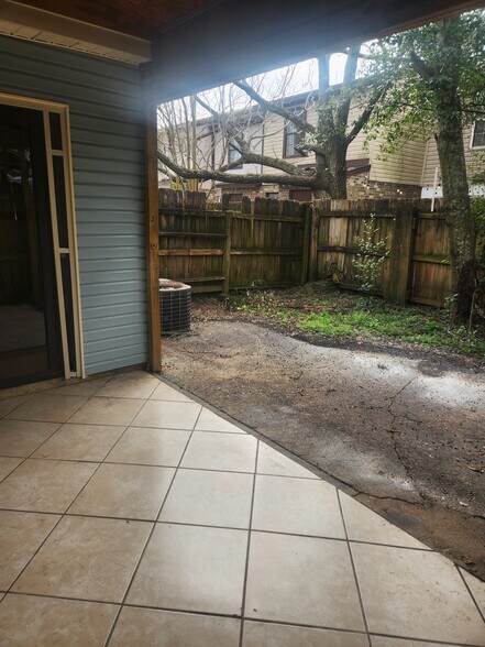 Back patio/storage/yard space - 2105 Langley Ave