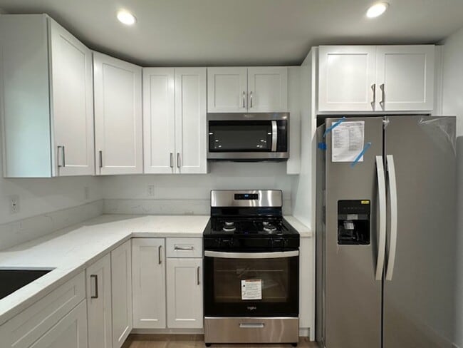 Building Photo - Completely remodeled and located on a quie...