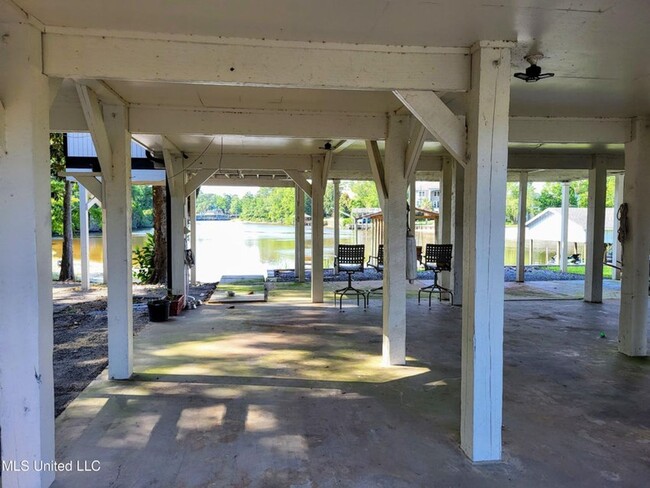 Building Photo - Riverfront Living with Private Boat Launch