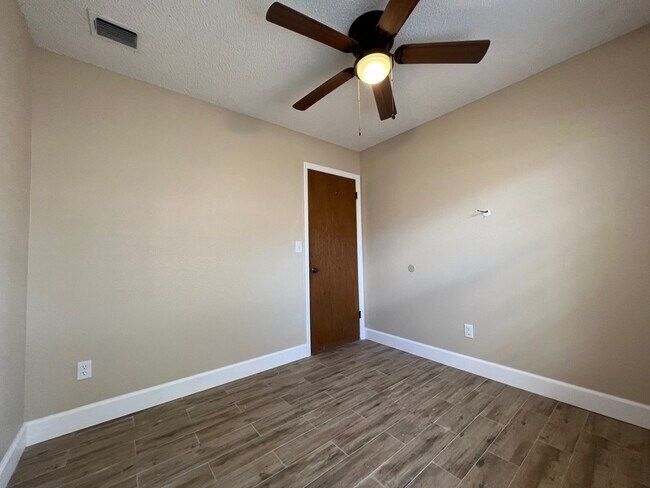 Building Photo - Newly Renovated 3/2 Home ~ Brand New Kitchen ~ Updated Bathrooms ~ Fenced Yard!
