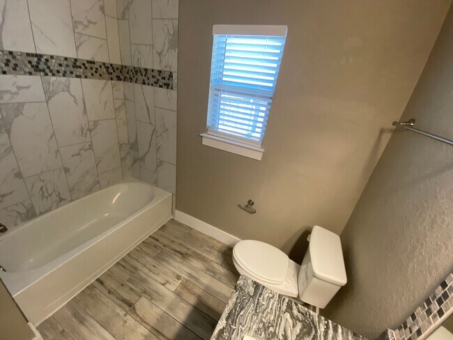 Building Photo - Located 1 Mile from IH 35/ No Carpet / Tons of Upgrades /  Turf Grass in Front Yard / Fenced in B...