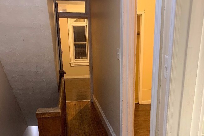 2nd Floor Hall Wall, view of bedroom 1, 2 and door to 3rd floor is on the left - 940 N 11th St