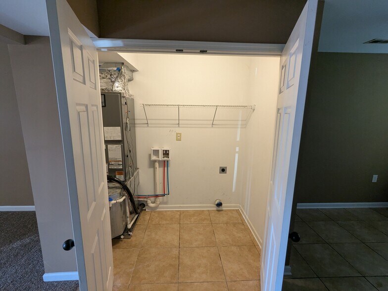 Laundry closet with hookups - 2237 Spring Meadow Ln SE