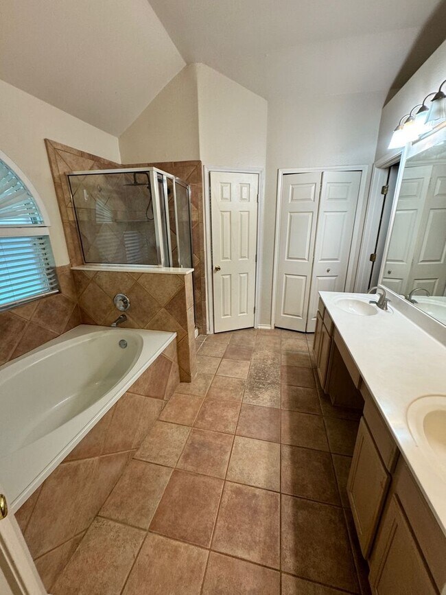 Building Photo - Ready For Move In! A Must See in Rogers Ranch - 4 Bedroom 2 Bath with Custom Features