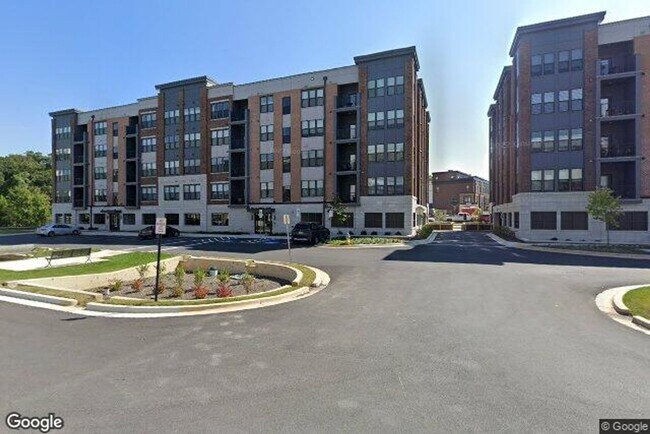 Building Photo - Sophisticated Rockville Corner Condo with Resort-Style Amenities, 2 Garage Parking Spaces