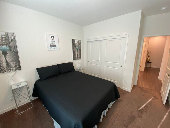 Building Photo - Welcome to the Best Deal in Town. Fully furnished 4 BD 2 BA house on a corner lot