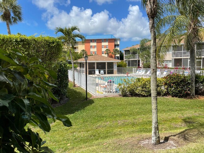 Building Photo - ANNUAL RENTAL - 3 BED / 2 BATH WITH CARPOR...