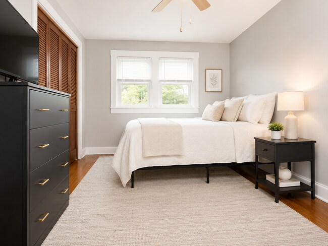 Building Photo - Charming 4BR Bungalow with Finished Basement & Fenced Yard