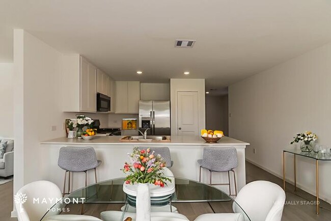 Building Photo - Now Leasing in Sunterra with Top-Tier Amenities