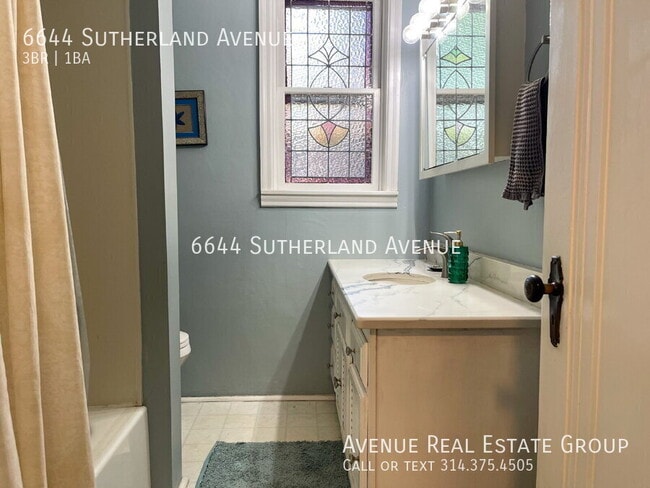 Building Photo - 6644 Sutherland Ave