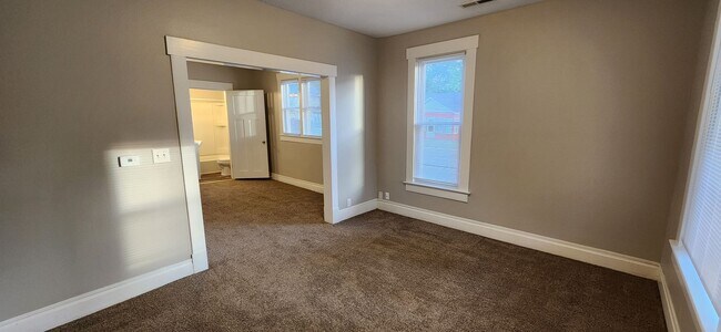 Building Photo - Spacious corner lot home with great natural light!