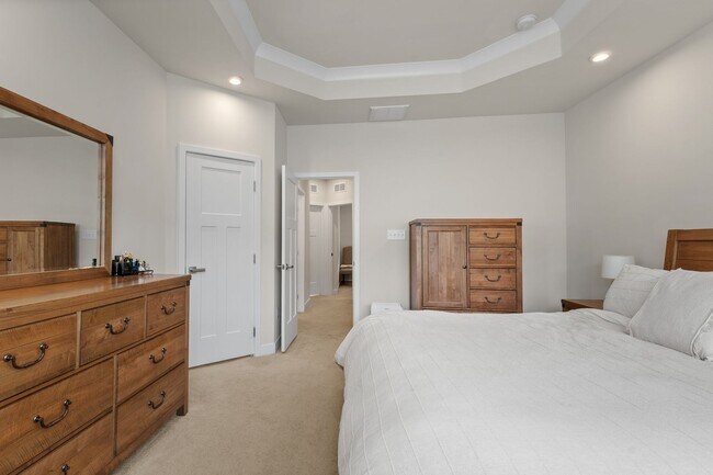 Building Photo - Luxurious three-story townhome with owner's suite and high-end finishes