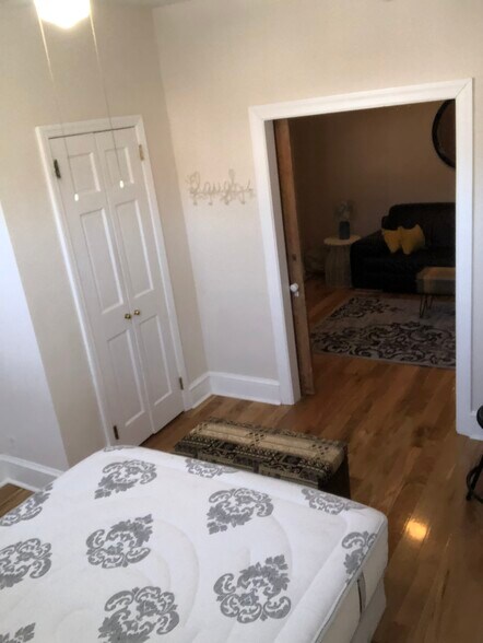 Front Bedroom looking into living room - 400 W Gay St