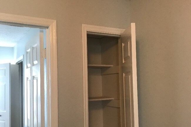 linen closet top of stairs - 2613 Wynterhall Rd SE