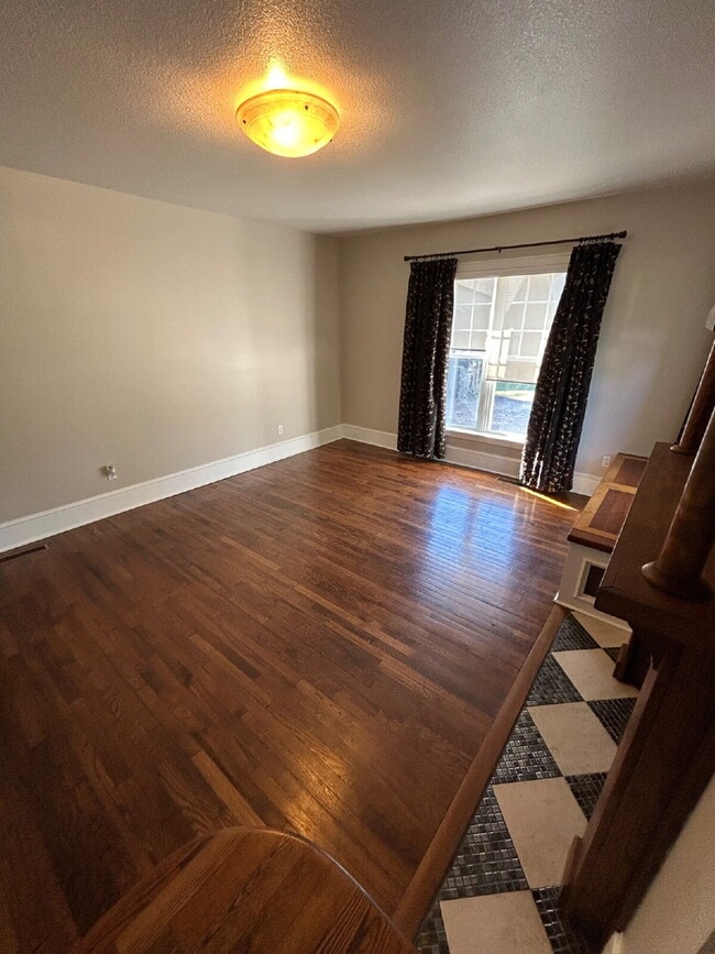 Building Photo - "Charming 4-Bedroom Retreat with Granite F...