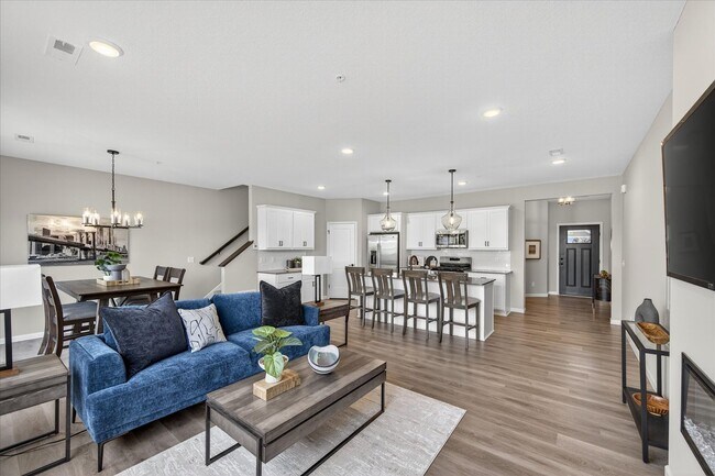 Building Photo - Westview townhome plan in Corcoran’s Hope Meadows community—a brand-new townhome development near...