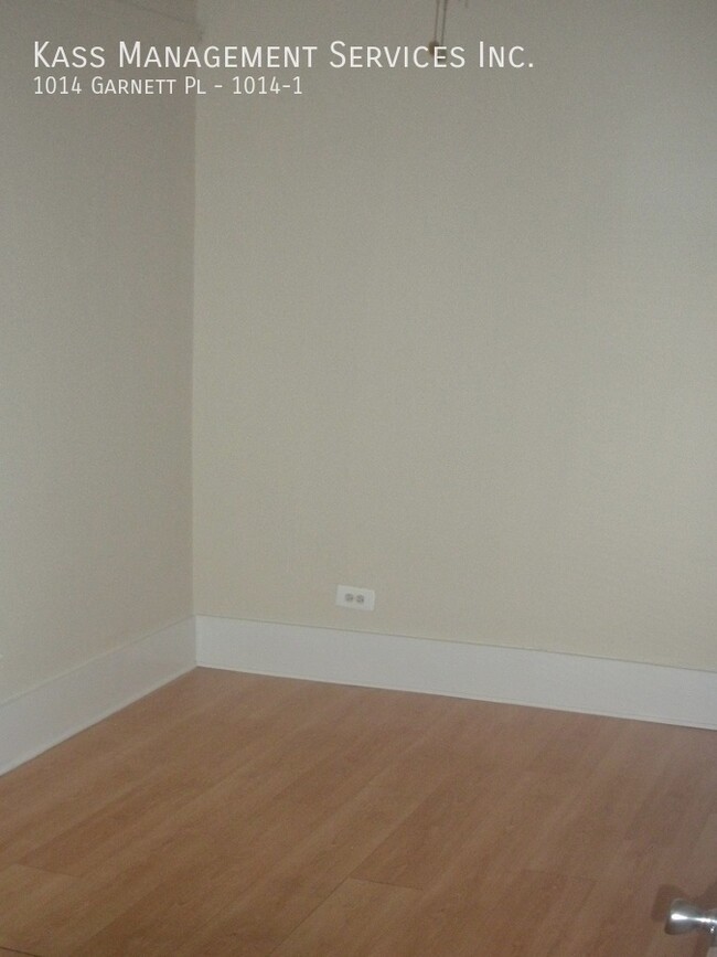 Building Photo - Very Spacious Duplex Apartment features 4 ...