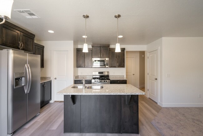 Building Photo - Modern 4-Bed Stand-Alone Home with Fenced Patio