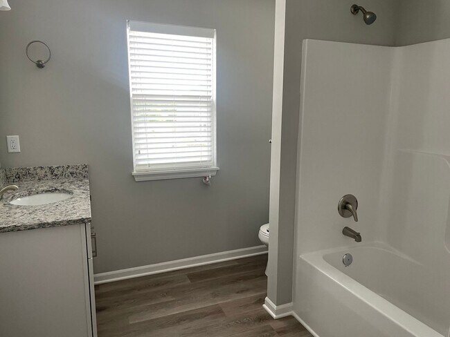 Building Photo - 4 bedroom available in Blue Springs! Coming Soon!