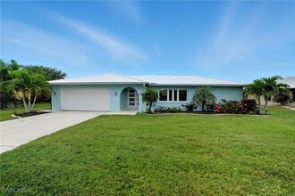 Building Photo - 6163 Plumosa Ave