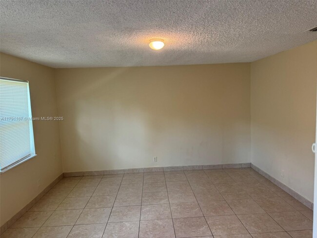 Building Photo - 312 N 62nd Ave