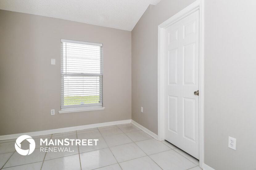 Building Photo - 7360 Lawn Tennis Ln