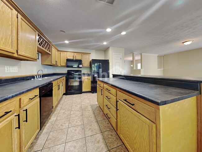 Building Photo - 10399 Peacock Ln