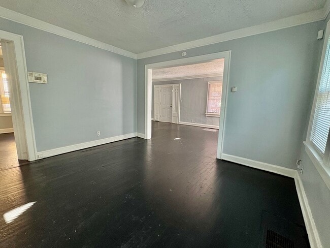 Building Photo - Spacious 2-Bedroom + Den Home with Ample Parking & Backyard!