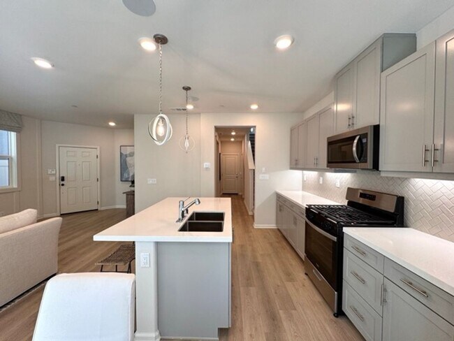 Building Photo - Brand New 4 Bedroom Home with Solar in Gat...