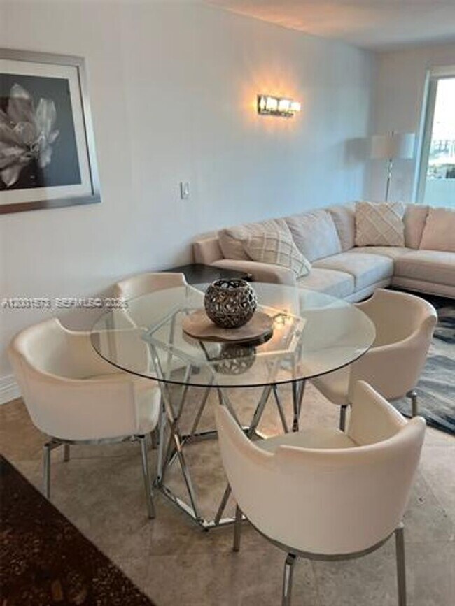 Building Photo - 9499 Collins Ave