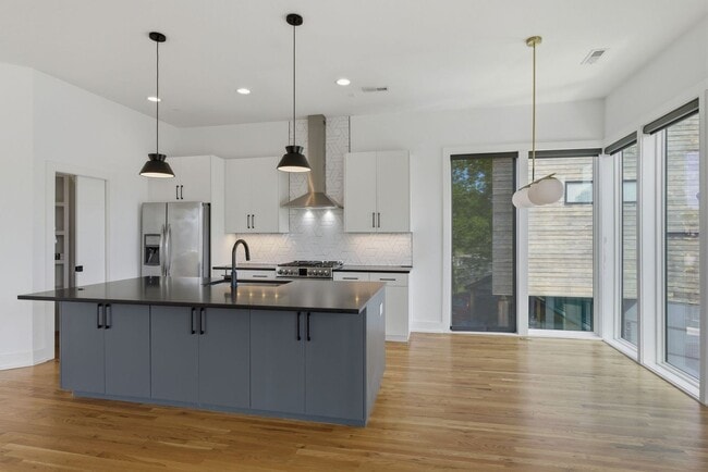 Building Photo - Beautiful 3-BR Property with Rooftop Deck!