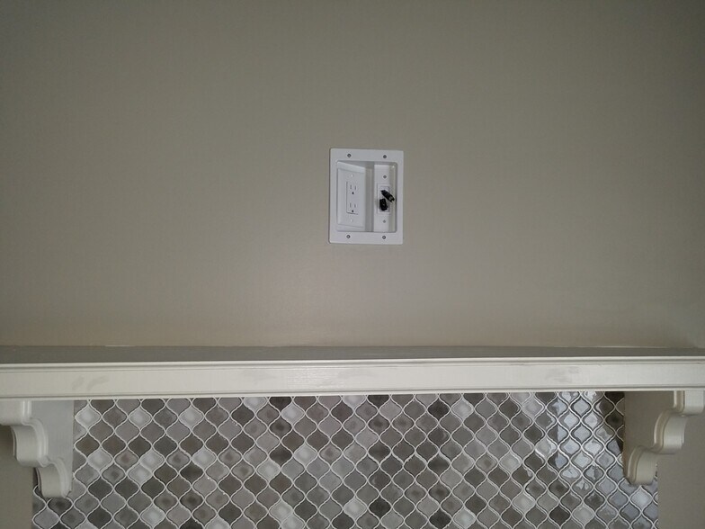 Cable and HDMI over mantel (set flush to wall so if you don't want to use it, cover with mirror/art - 31 Sally Ann Pl