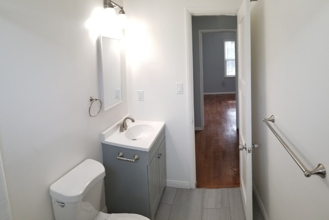 Bathroom with bedroom in background - 3780 Cimarron St