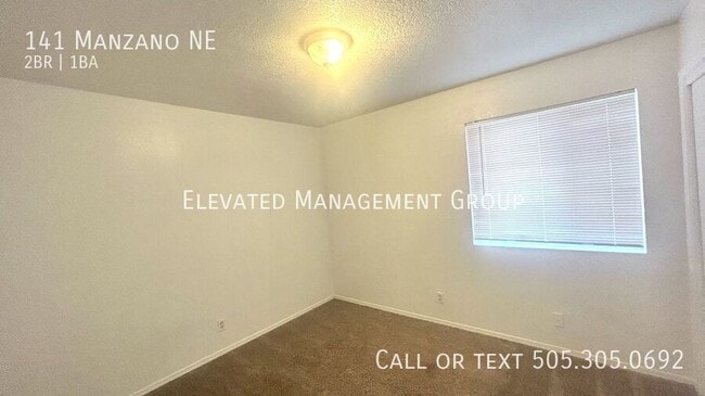Building Photo - 141 Manzano St NE