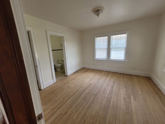 Building Photo - Super Charming - Wood Floors Throughout
