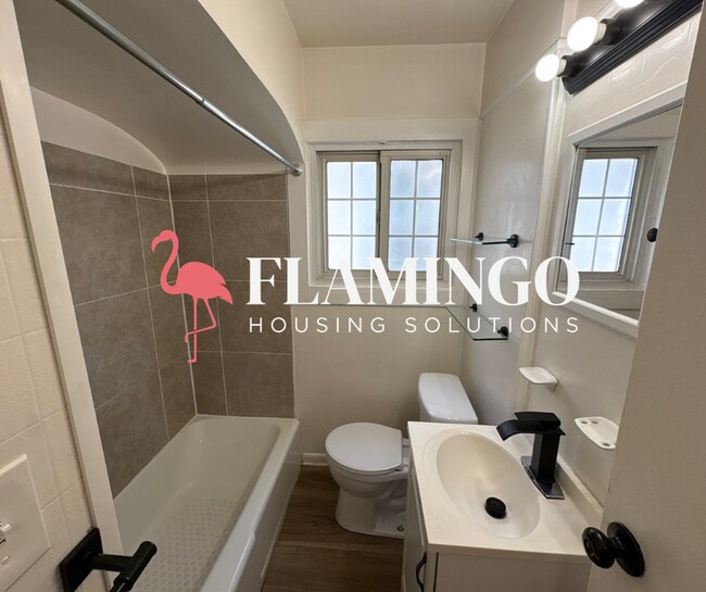 Building Photo - Charming 2 Bedroom, 1 Bath Home – Refinished Hardwood Floors, Detached Garage & More!