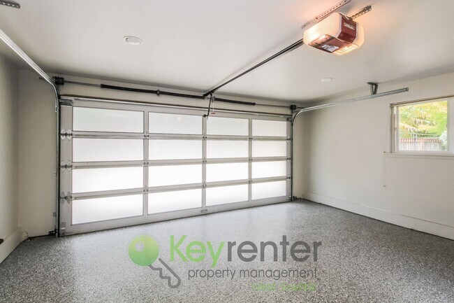 Building Photo - Waterfront Elegance with Private Dock and Designer Finishes