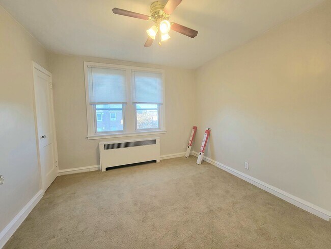 Building Photo - Stunning 4-Bedroom Townhome with Finished ...