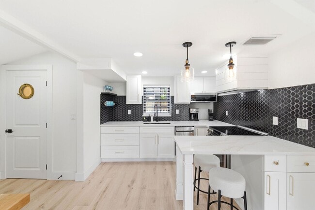 Building Photo - The Dark Horse — Style in the Heart of St. Pete