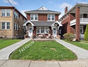 Building Photo - 1457 Tolma Ave