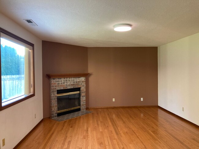 Building Photo - Split-Level Home with Fireplace and Patio ...