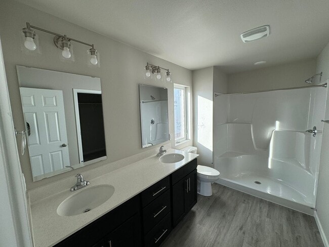 Building Photo - 2 Bed | 2 Bath | 3 Stall Garage | Patio Twin-Home