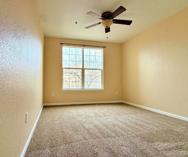 Building Photo - NEW CARPET NEW PAINT!! Clean and Bright 2BR 2BTH Condo Close To DIA. Gated Community in First Cre...