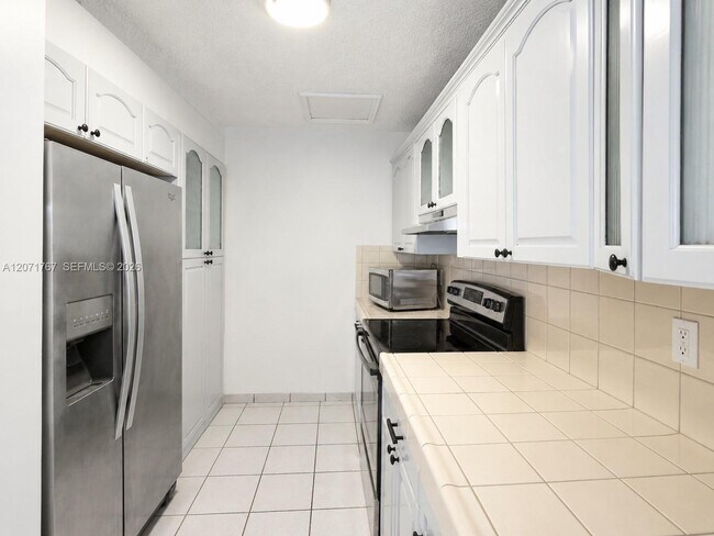Building Photo - 6605 W 26th Dr
