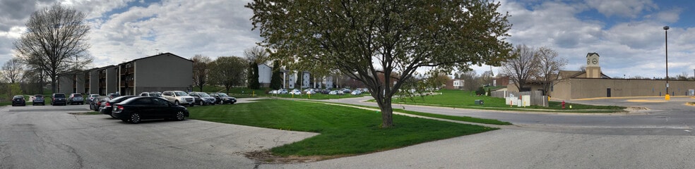 Building, parking, shopping center, and neighborhood - 2601 Westwinds Dr