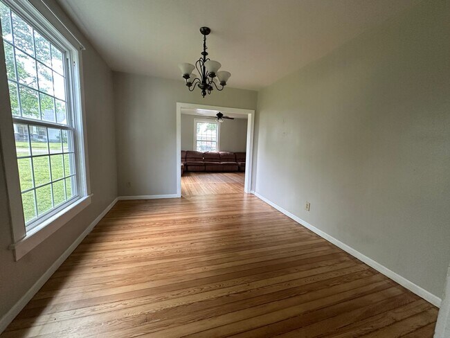 Building Photo - Welcome to this charming 3-bedroom, 2-bathroom home located in Atkins, AR