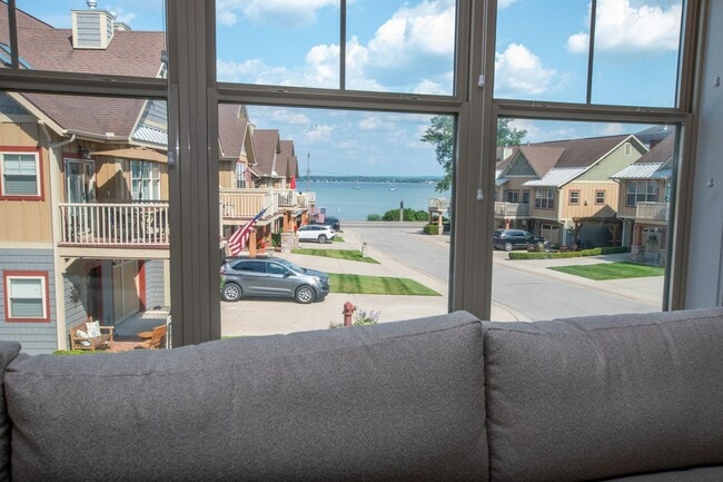 Building Photo - Experience Elevated Living with West Bay V...