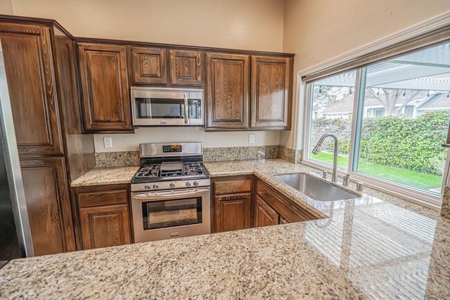 Building Photo - COMING SOON! Charming 2-Bedroom Home with a Versatile Loft in The Bungalows of Valencia!