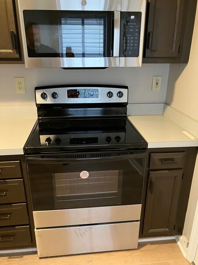 Building Photo - Comfortable, All-New Liverpool TownHome